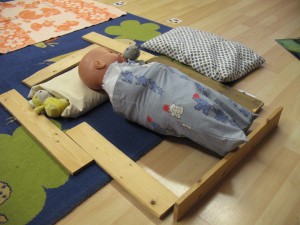 ... et un petit lit bien aménagé pour faire dormir bébé !